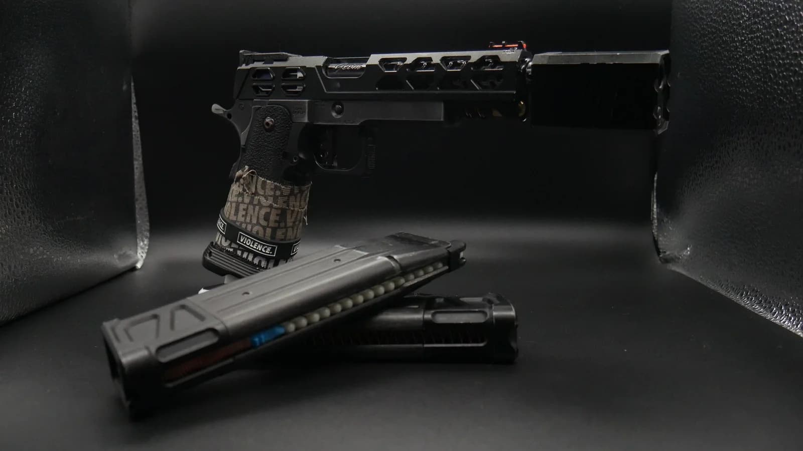 Black Phantom 5.1 Hi-Capa with spare magazine