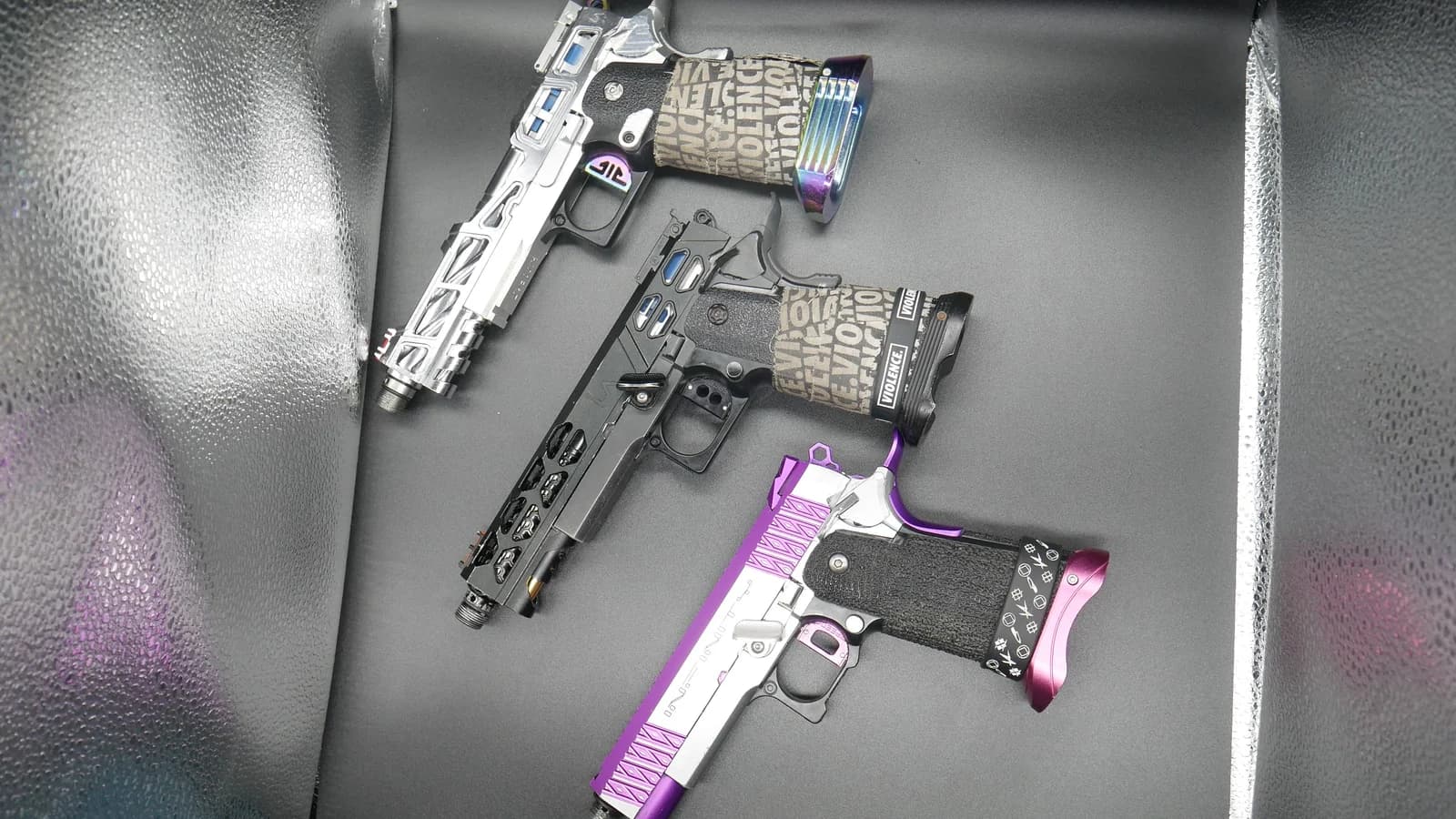 Three completed custom builds photographed from above